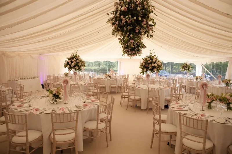 Jo & Simon inside their wedding marquee